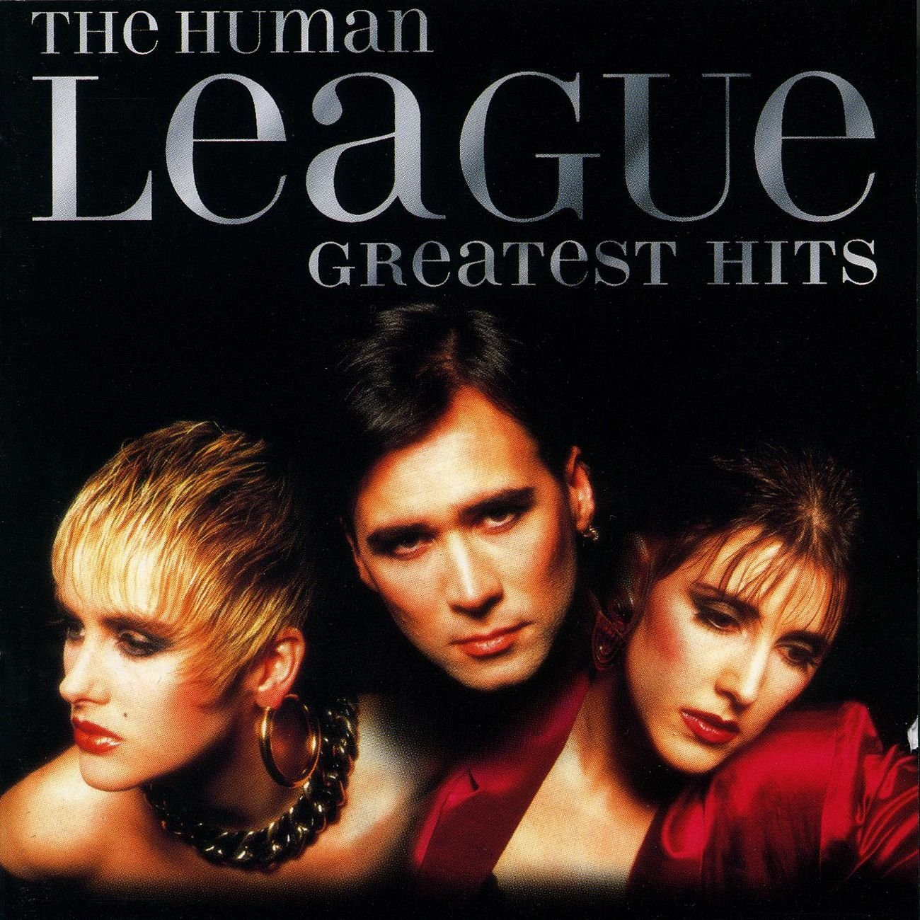 Albumhoes van The Human League Greatest Hits, met de drie leden van de band.