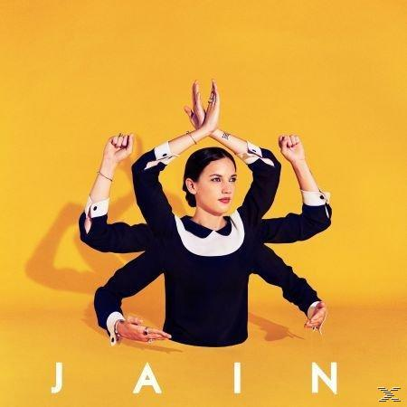 Albumcover: Frau mit mehreren Armen auf gelbem Hintergrund. Text: 'JAIN'.