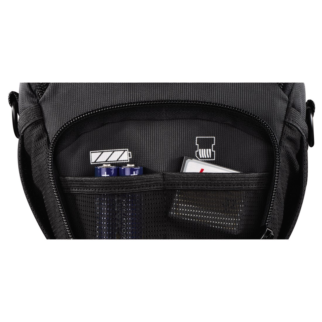 Inside a black bag with batteries and a memory card.