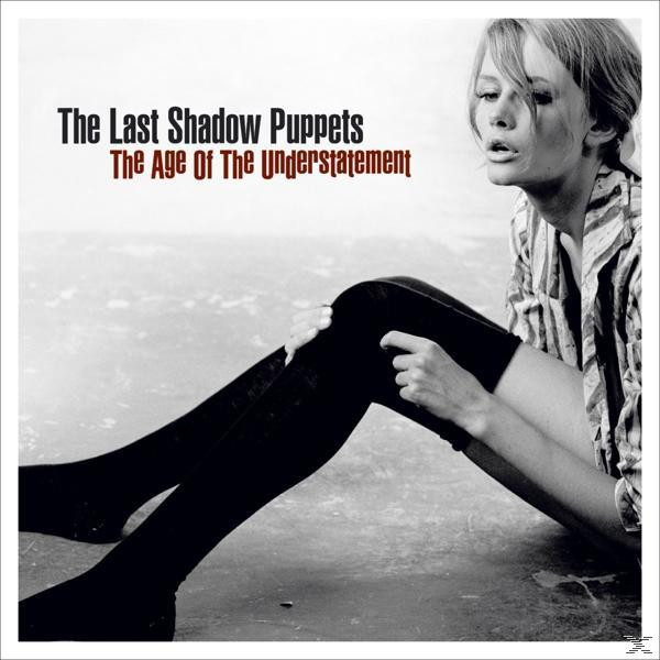 Albumcover mit einer Frau auf dem Boden.