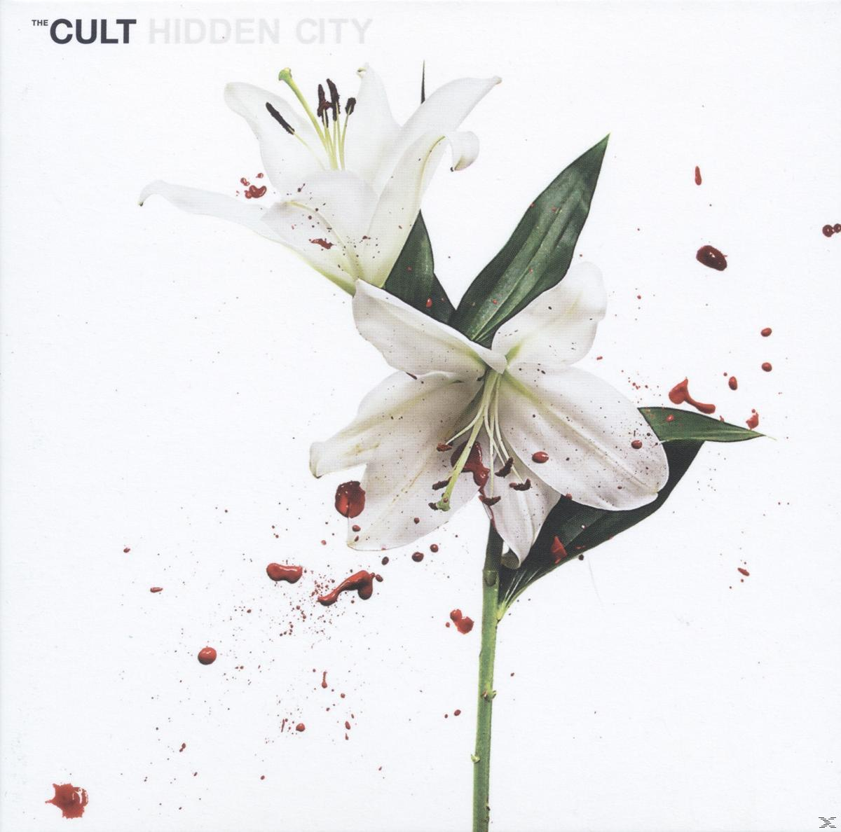 Albumcover: Weiße Lilien mit weißem Hintergrund. Rote Farbspritzer um die Blumen herum.