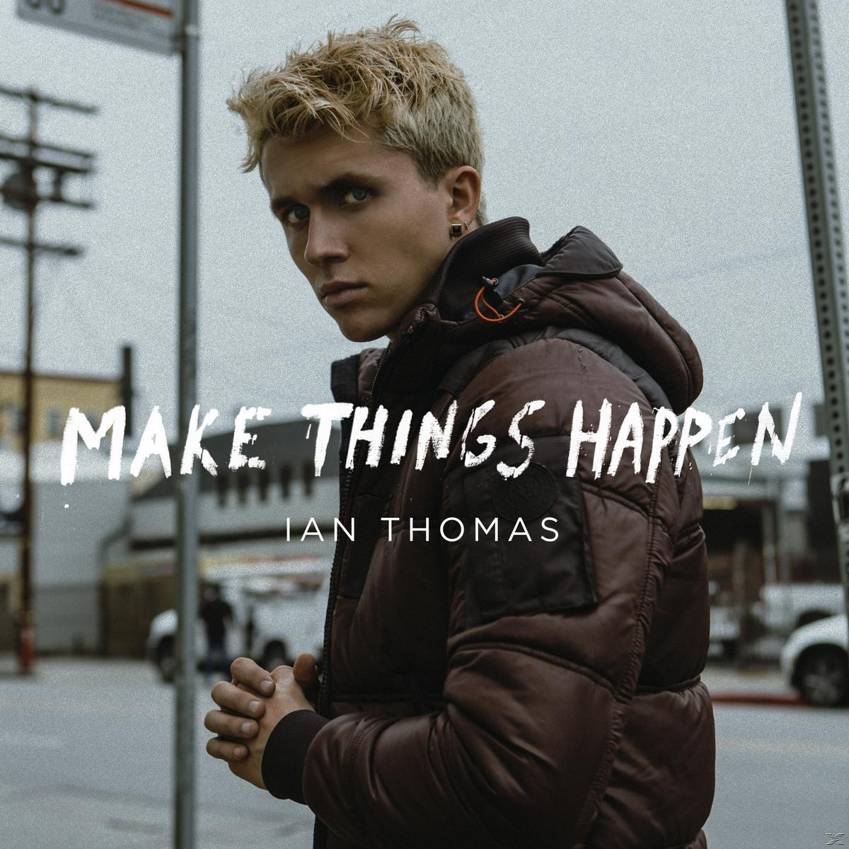Albumhoes voor "Make Things Happen" van Ian Thomas, met een man in een jas.