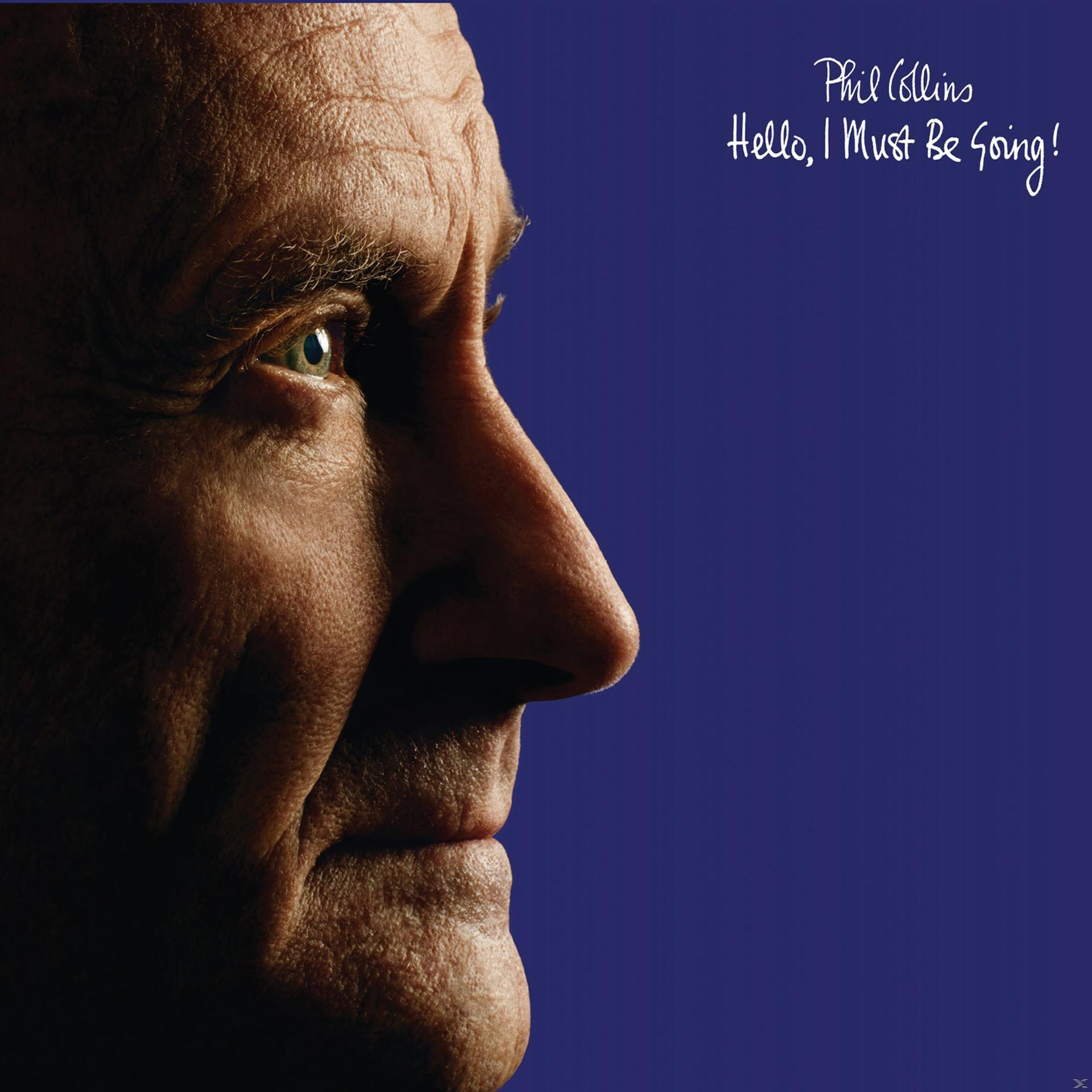 Egy férfi profiljának közeli képe, kék háttérrel. Szöveg: 'Phil Collins'.