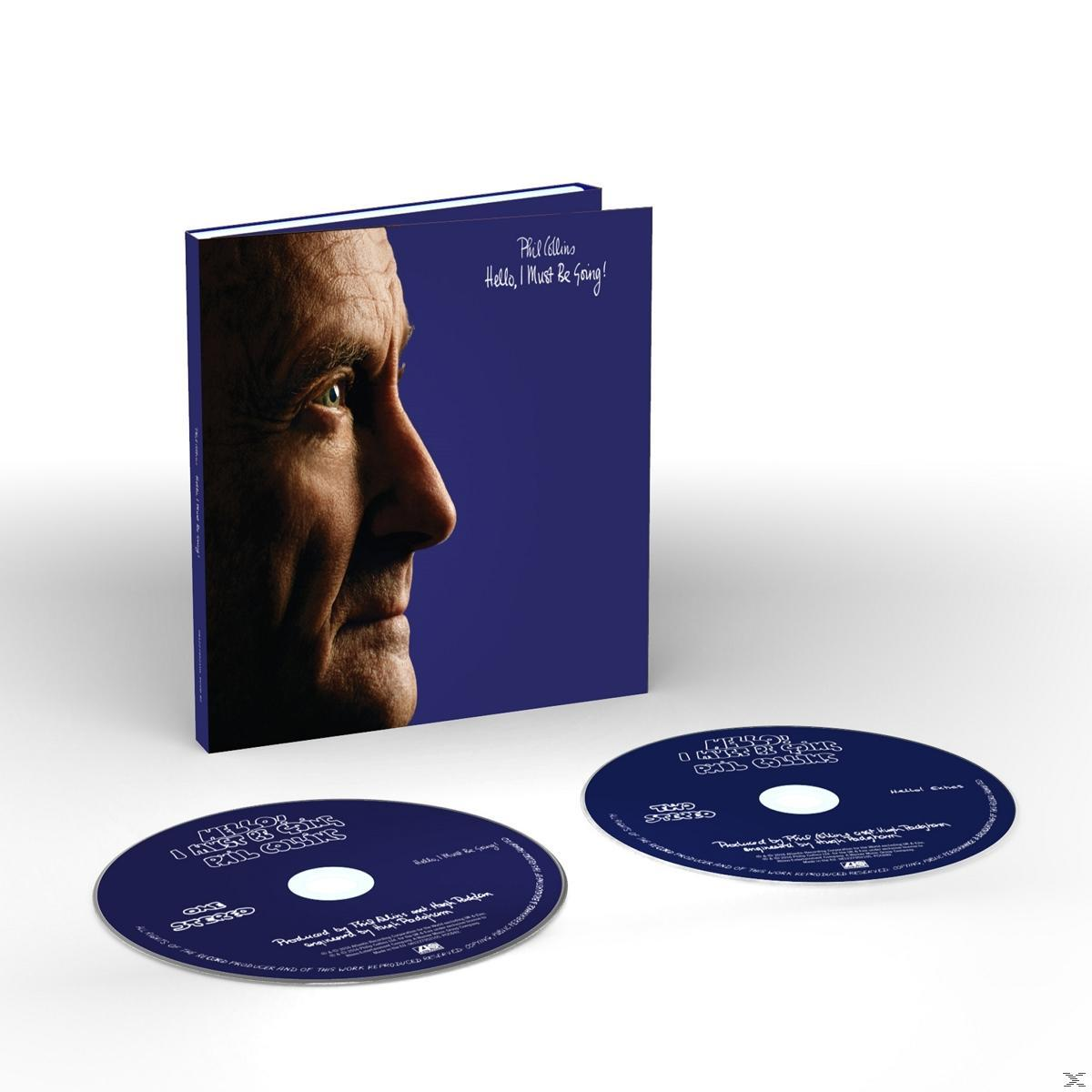 Könyvborító Phil Collins portréval és az album címével, két CD-vel alatta, kék háttéren.