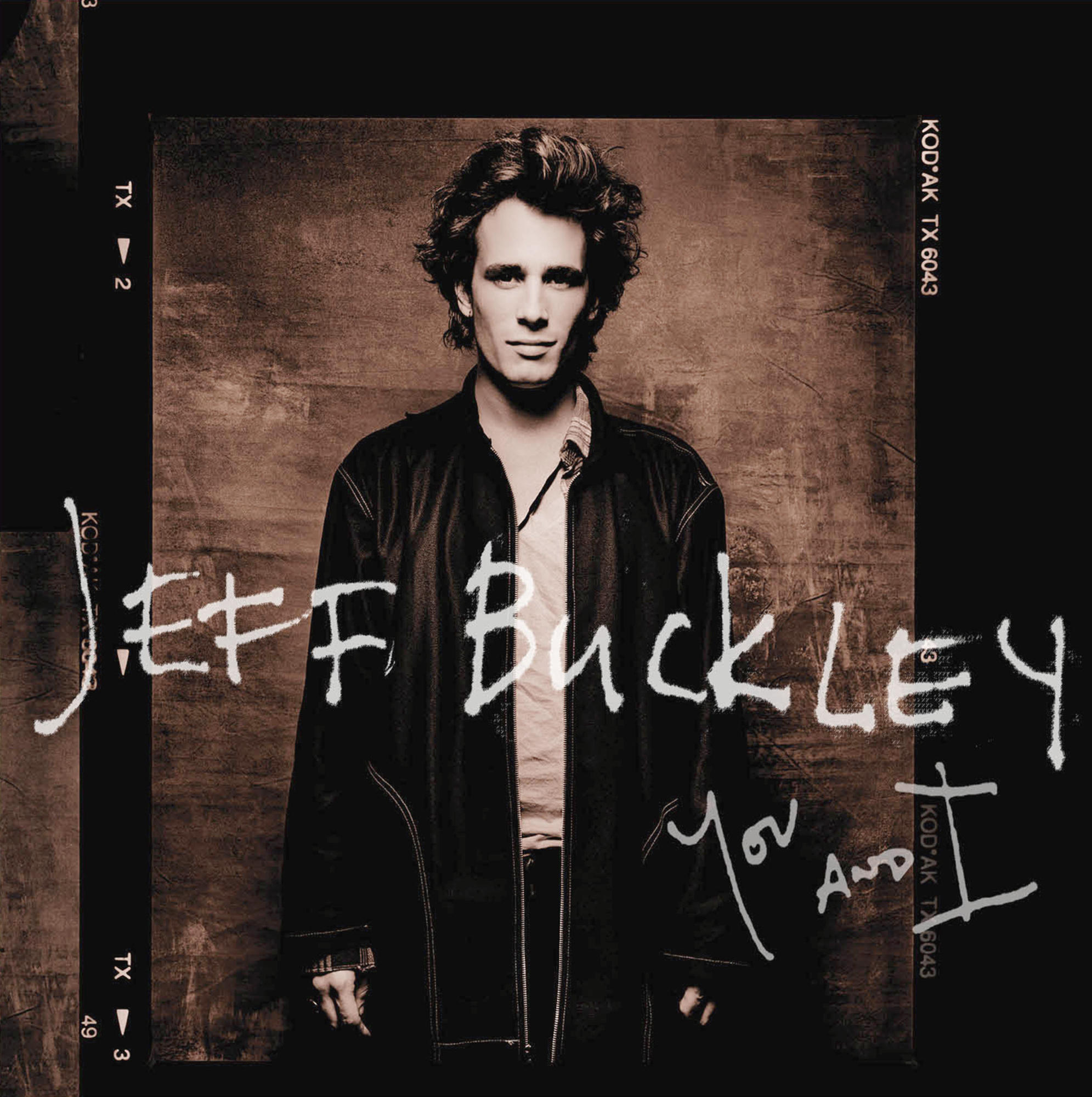 Mann in schwarzer Lederjacke, weißem Hemd, stehend. Albumtitel: 'You and I' von Jeff Buckley.