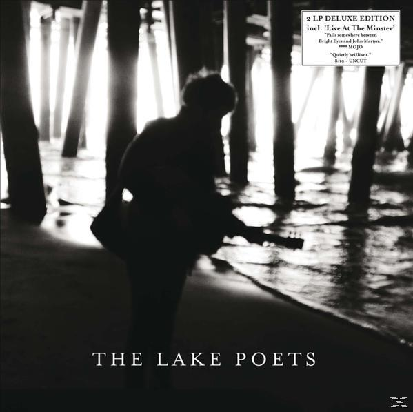 Albumcover: Silhouette einer Person, die Gitarre auf einem Pier spielt, Schwarzweiß.
