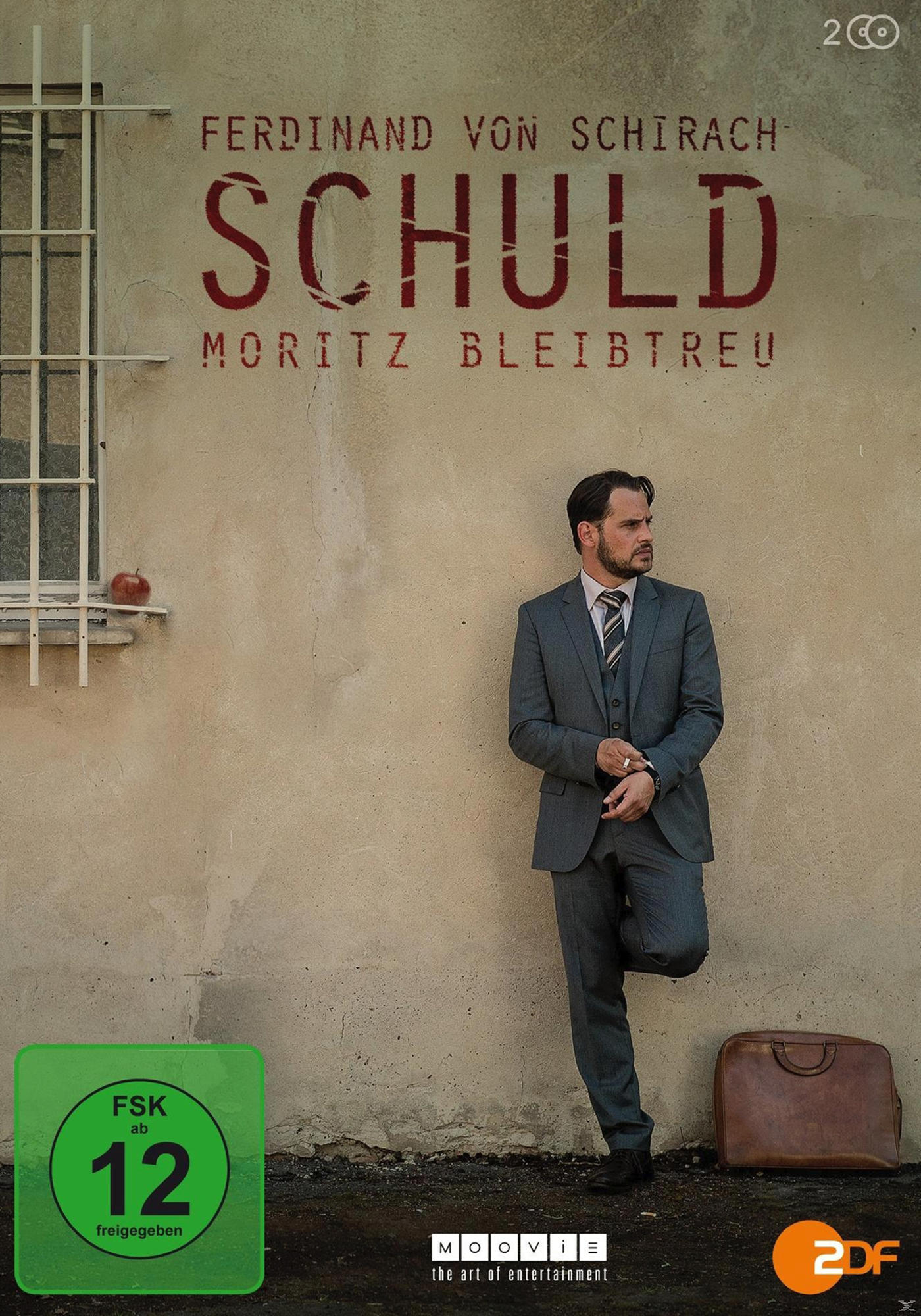 DVD-Cover für Schuld. Ein Mann im Anzug lehnt an einer Wand. Text oben.