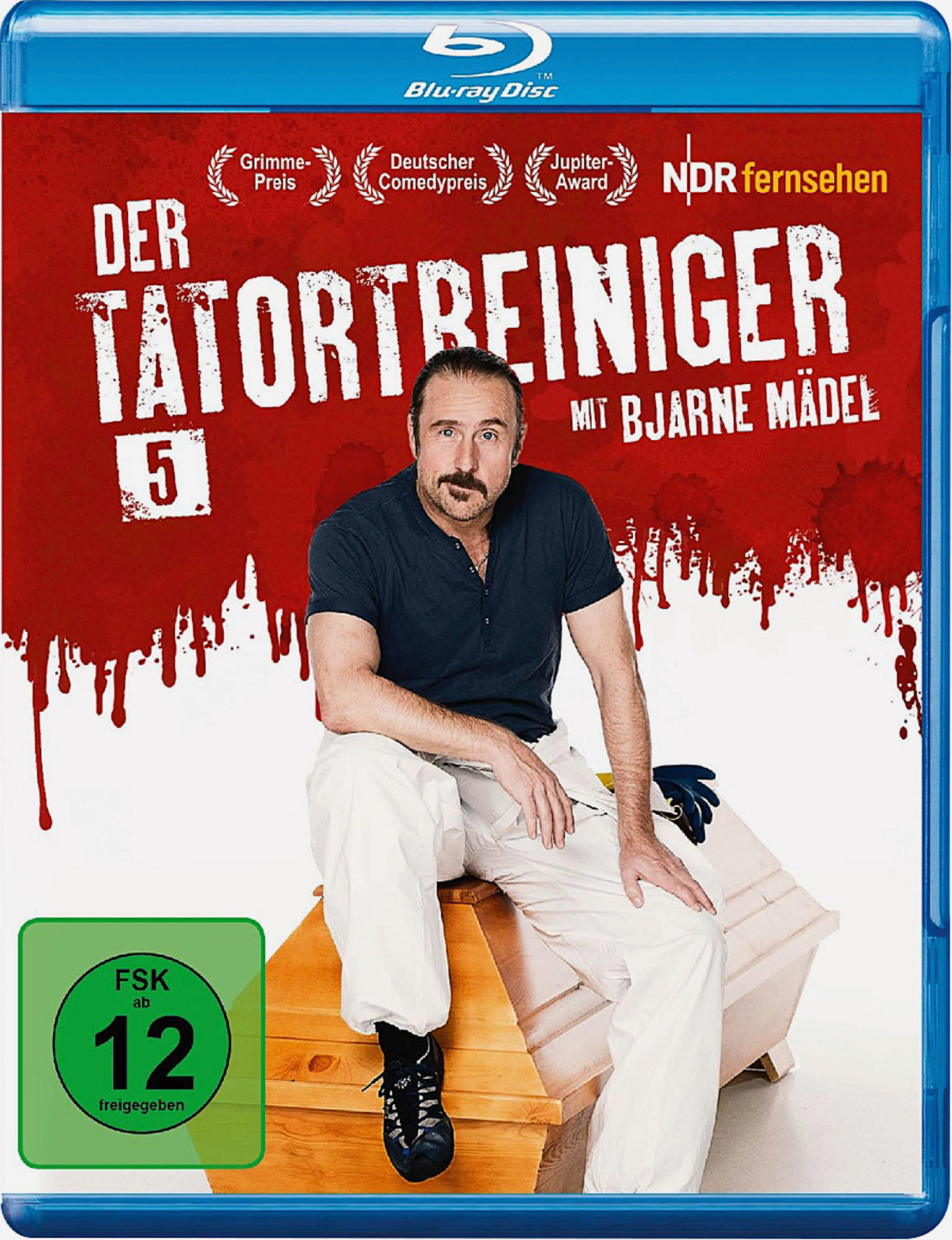 DVD-Cover: 'Der Tatortreiniger' mit Bjarne Mädel. Grün-rotes Farbschema mit der Zahl 5.