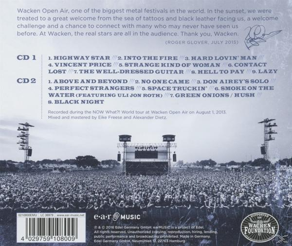 Rückseite einer Musik-CD mit Menschenmenge, Bühne, Text über die Veranstaltung und Logo. Schwarz und weiß.