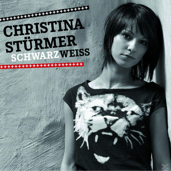 Albumcover von Christina Stürmer 'Schwarz Weiss' mit einem Foto einer Frau, die an einer Wand lehnt.