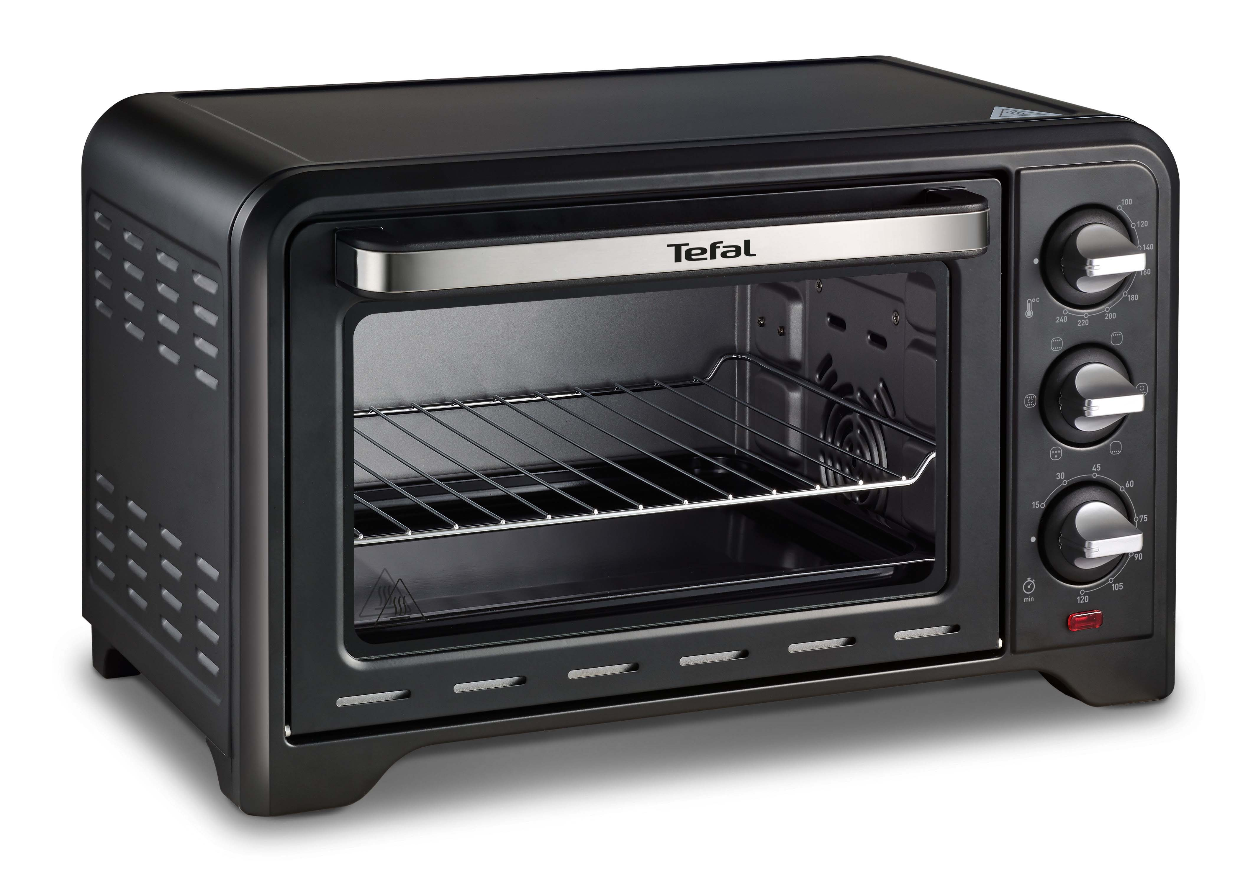 Zwarte broodroosteroven op een wit oppervlak. Zilveren handgreep en knoppen. Draadrooster binnenin. Zwart oppervlak.