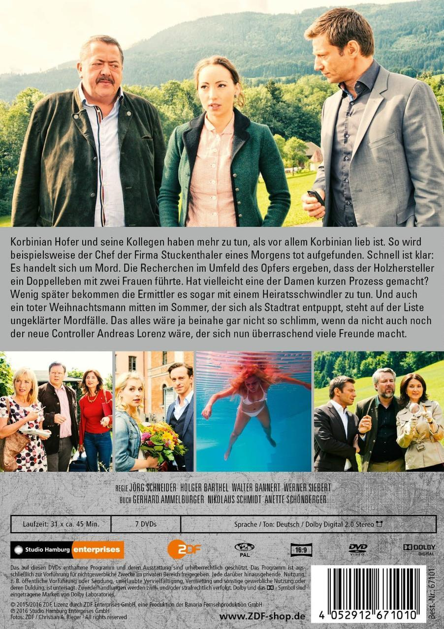 DVD-Cover. Männer und Frauen vor einem Wald. Text auf der Rückseite. Mehrere Personen sind abgebildet.