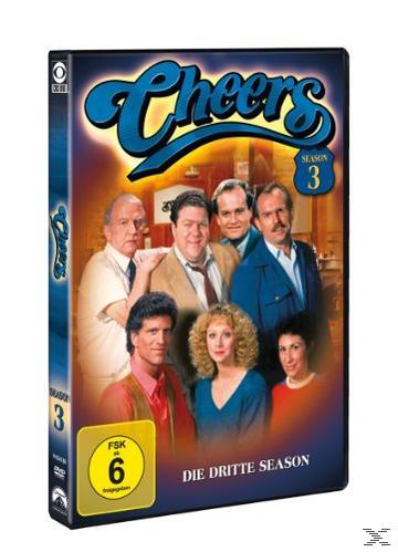 DVD-Cover von Cheers: Staffel 3, mit Fotos der Besetzung und dem Logo der Show.