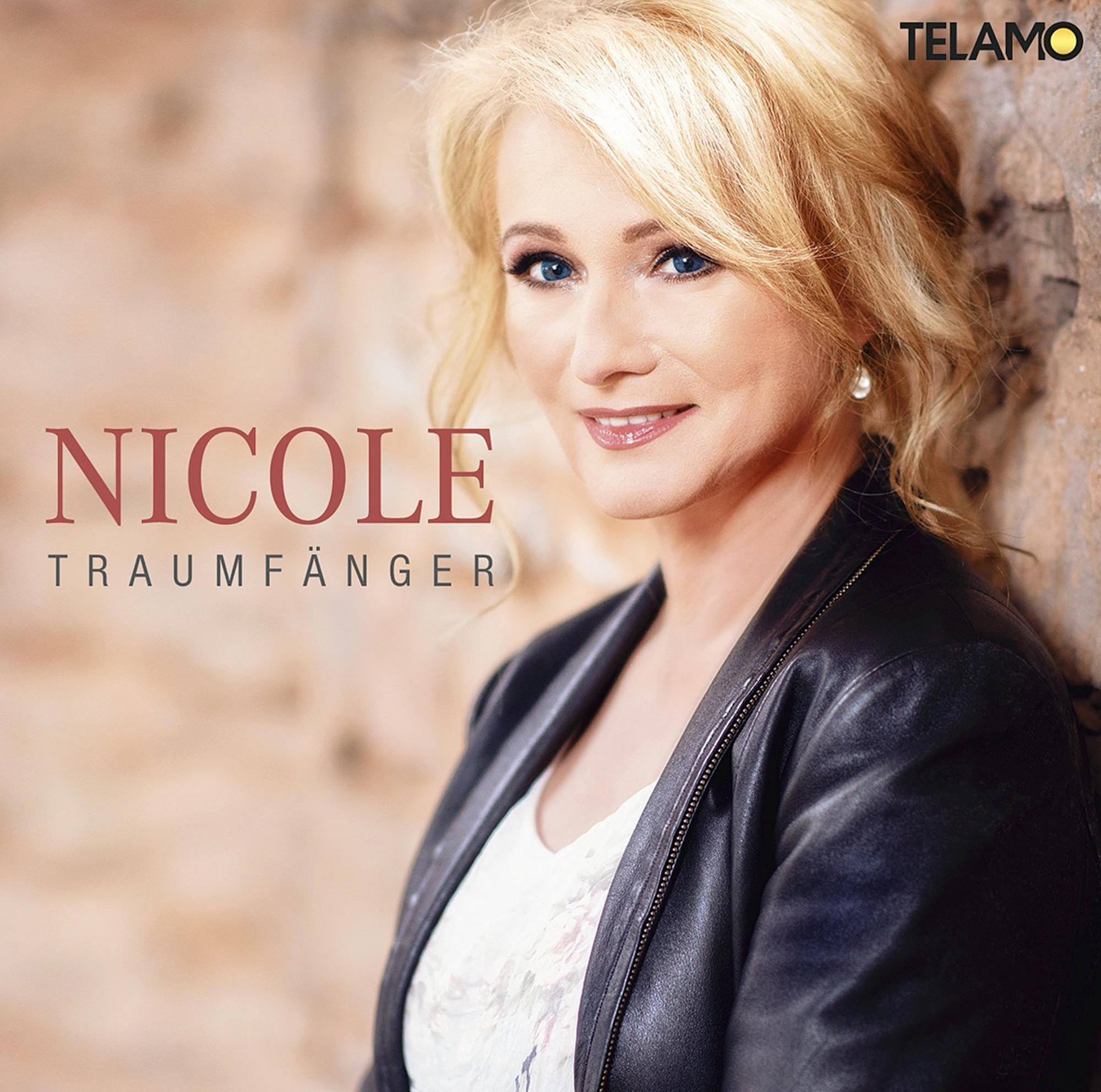 Albumcover mit Nicole. Sie ist eine blonde Frau in einer schwarzen Jacke. Der Titel lautet 'Traumfänger'.