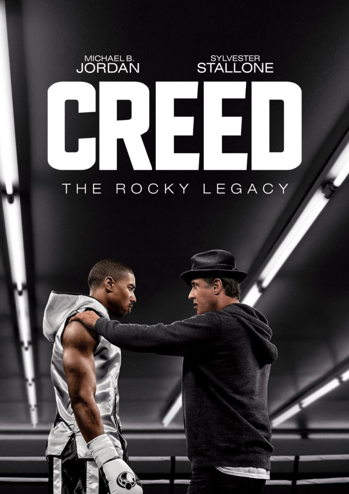Affiche du film "Creed". Michael B. Jordan et Sylvester Stallone se font face sur un ring de boxe.