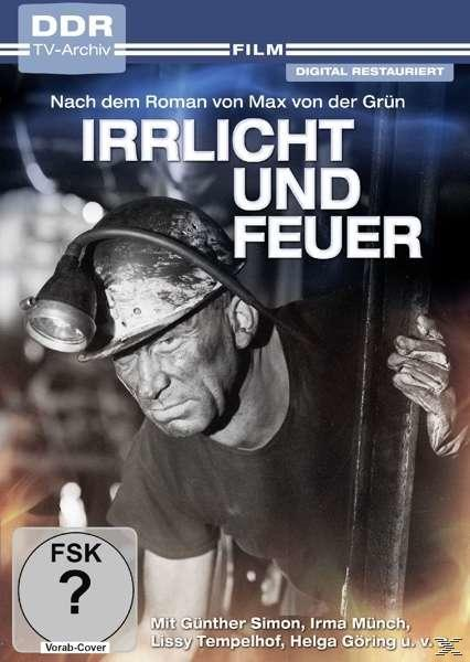 Filmplakat. Ein Mann mit Helm und Lampe blickt den Betrachter vor dunklem Hintergrund an.