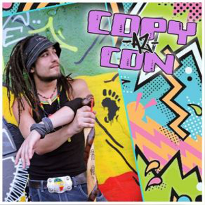 Egy rasztahajú férfi, aki egy spray-t tart. Graffitiművészet a háttérben. Album borító.