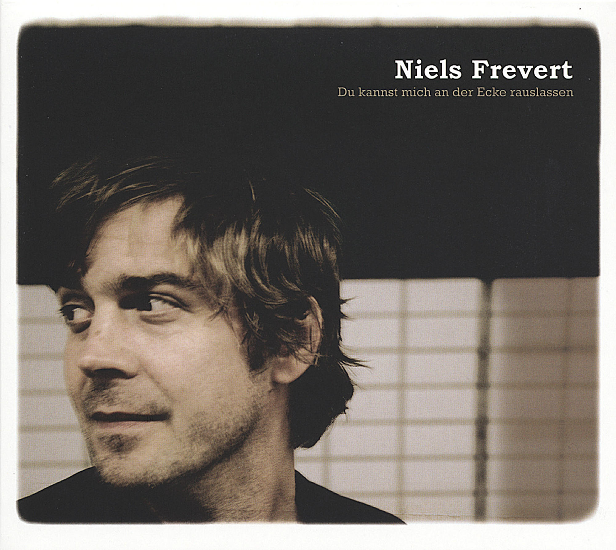 Albumcover: Das Gesicht eines Mannes mit Text oben und unten. Titel: Du kannst mich an der Ecke rauslassen.