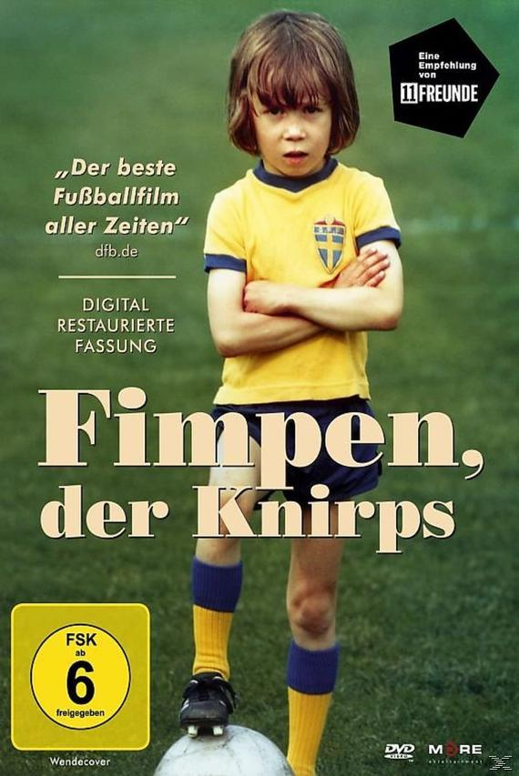 Ein junger Junge mit gelbem Trikot hält einen Fußball.