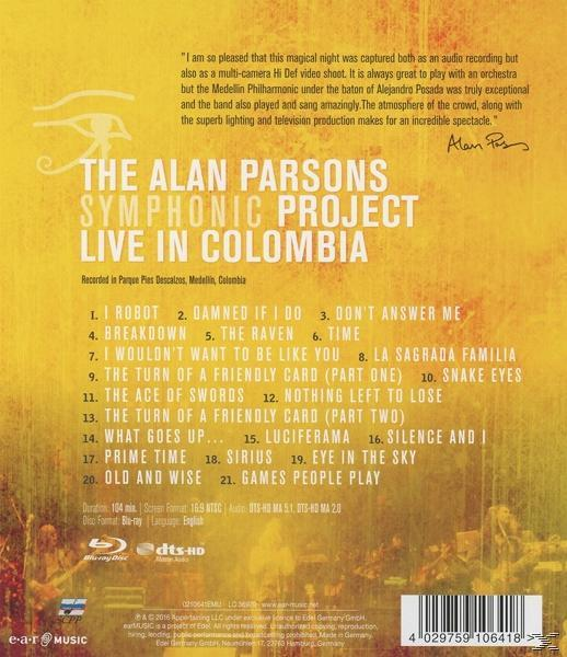 Albumcover: Alan Parsons Project live in Kolumbien. Text vor gelbem Hintergrund mit Titelliste.
