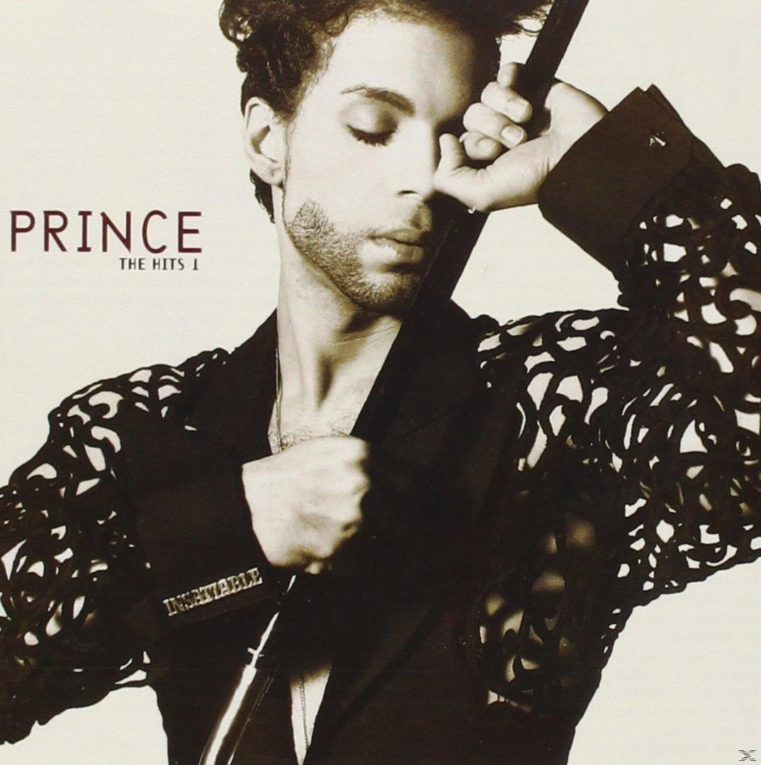 Album cover: Prince in a black jacket, holding a black object. The word 'PRINCE' is on the left.