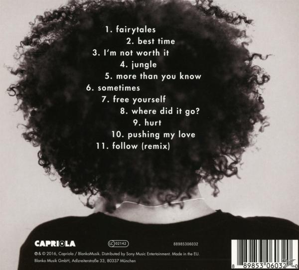 Rückseite einer Frau mit lockigem Haar, Album-Rückseite mit Trackliste.