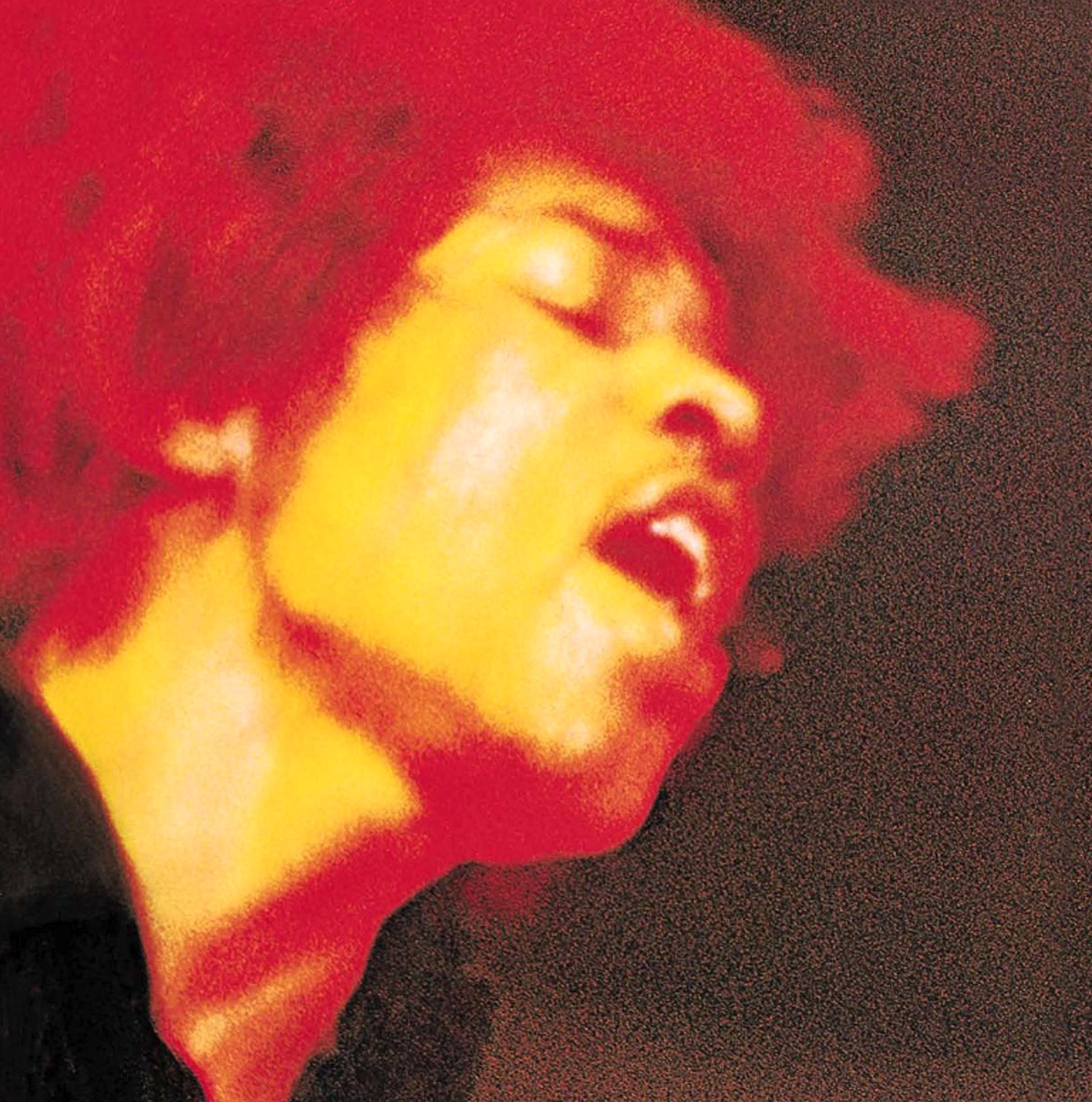 Close-up van Jimi Hendrix' gezicht, met rood haar en een geel getint gezicht.