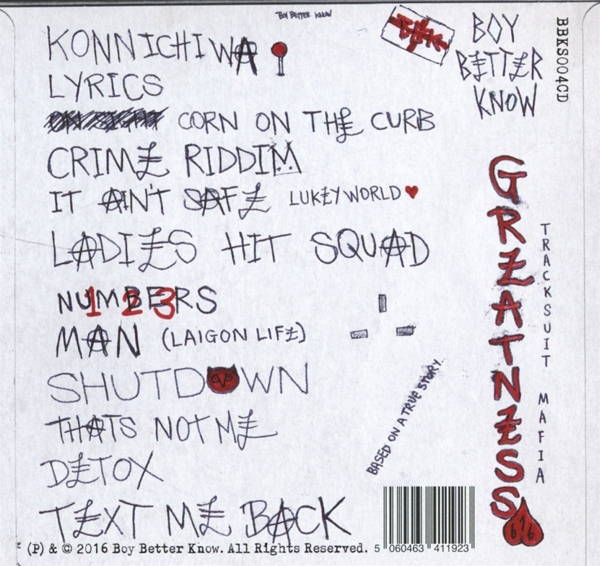 Rückseite eines Albums mit handgeschriebenem Text. Mehrere Songtitel sind gelistet.