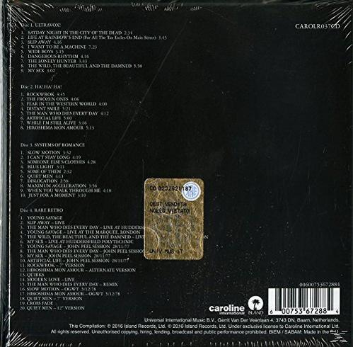 CD-Rückseite mit Songtiteln und Titellisten, einschließlich eines Aufklebers mit Text auf schwarzem Grund.