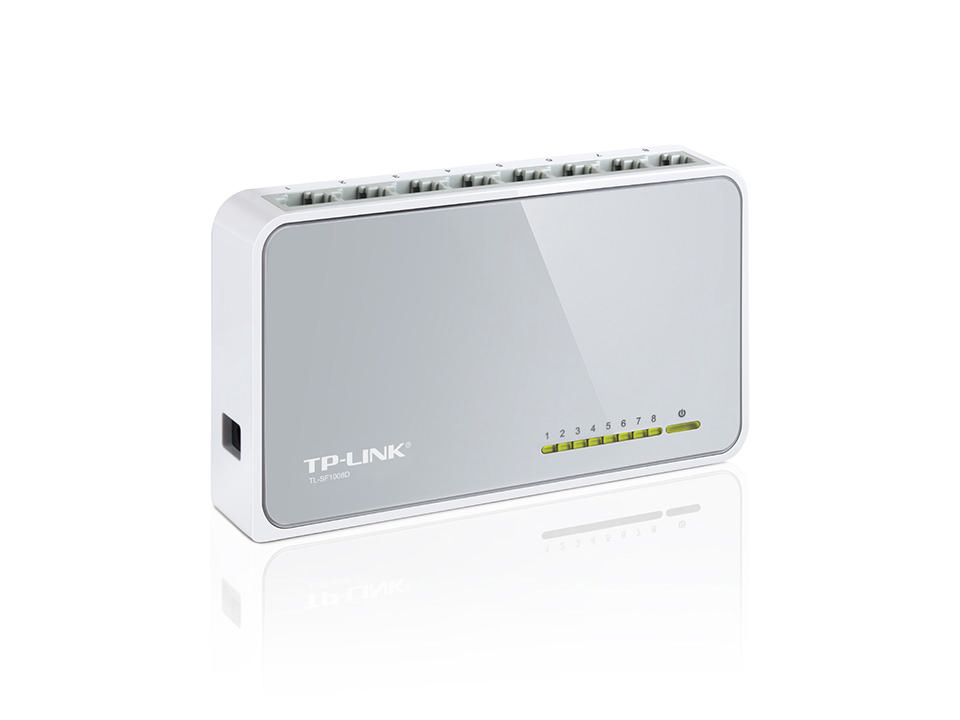 Sekiz bağlantı noktalı beyaz ve gri TP-Link anahtarı. Yeşil LED ışıkları yanıyor.