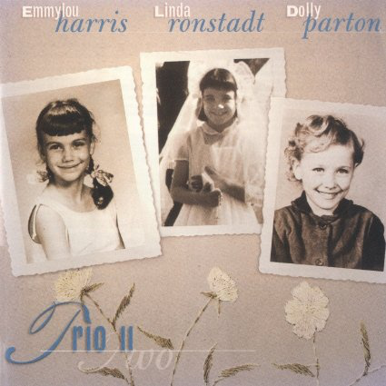 Album borító Emmylou Harris-szel, Linda Ronstadt-tal és Dolly Parton-nal. Három portré virágos keretben.