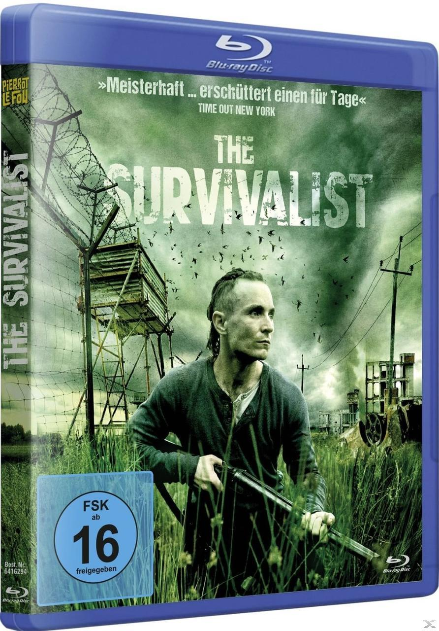 DVD-Hülle mit Filmplakat. Ein Mann mit einer Waffe steht an einem Stacheldrahtzaun.