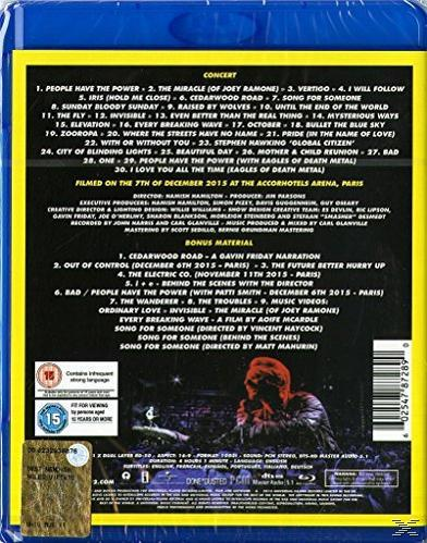 Pochette de disque Blu-ray avec texte et une image de performance en direct.