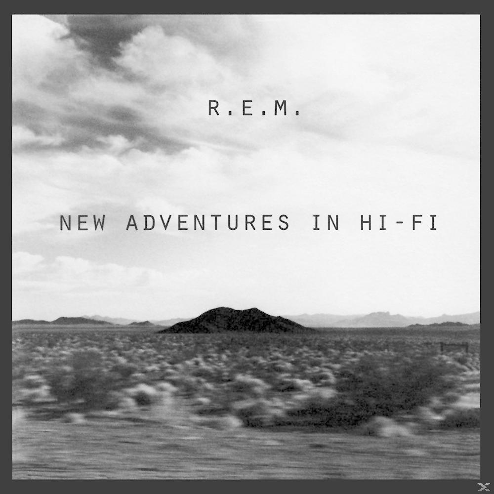 Fekete-fehér kép egy tájról szöveggel. R.E.M. New Adventures in Hi-Fi.