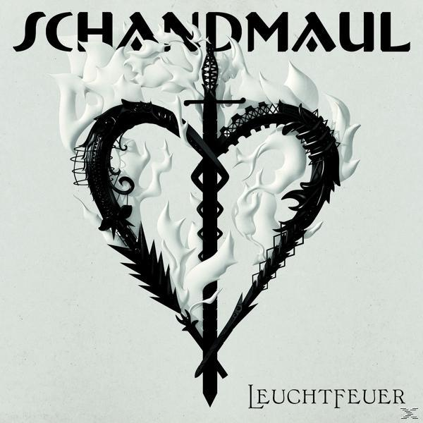 Albumcover mit einem Herzen aus einem schwarzen Drachen und weißen Flammen, mit einem Schwert in der Mitte.