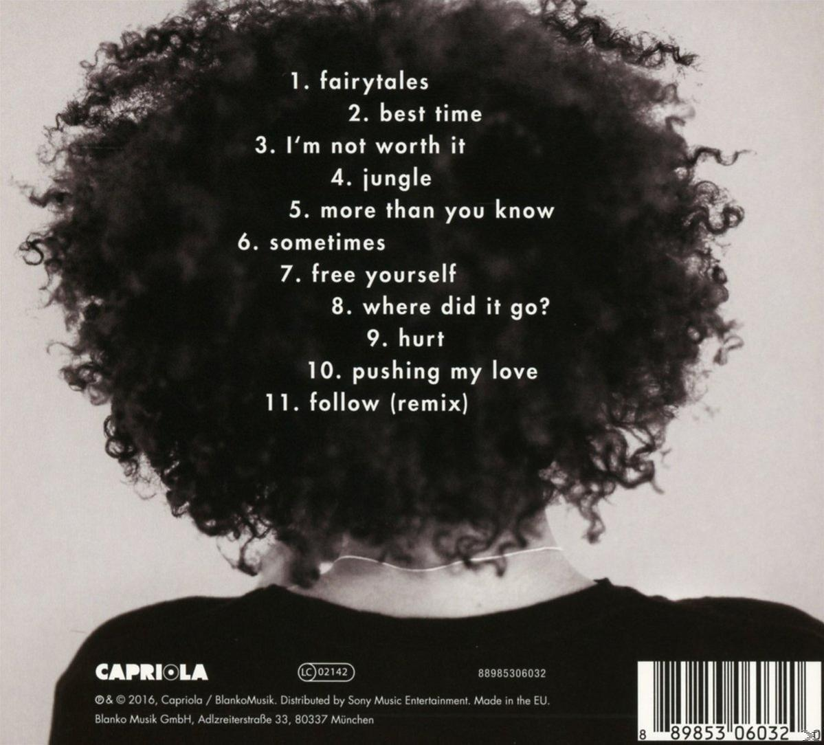 Rückseite eines Albumcovers mit einer Frau mit lockigem Haar. Songtitel sind aufgeführt.