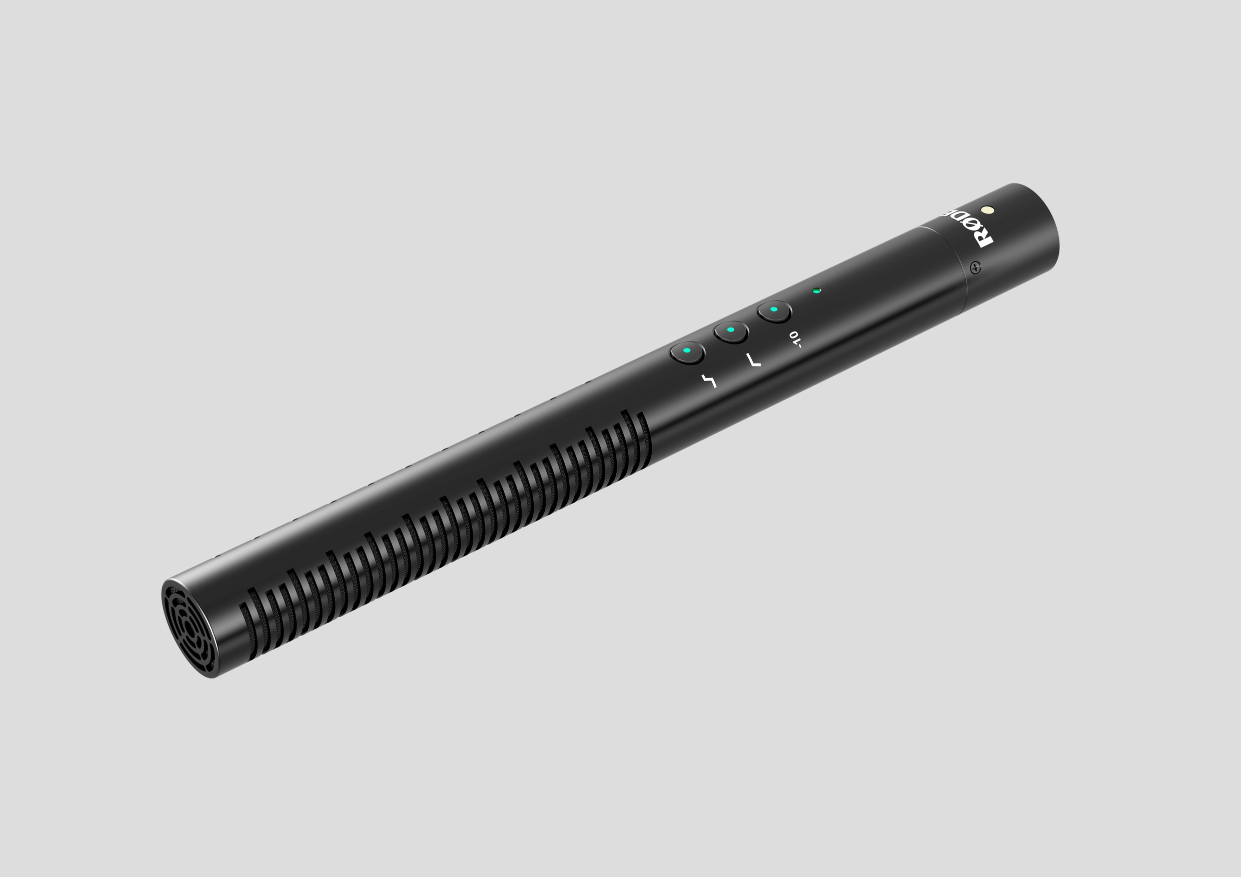 Un microphone canon noir avec des étiquettes et des LED vertes sur fond gris.