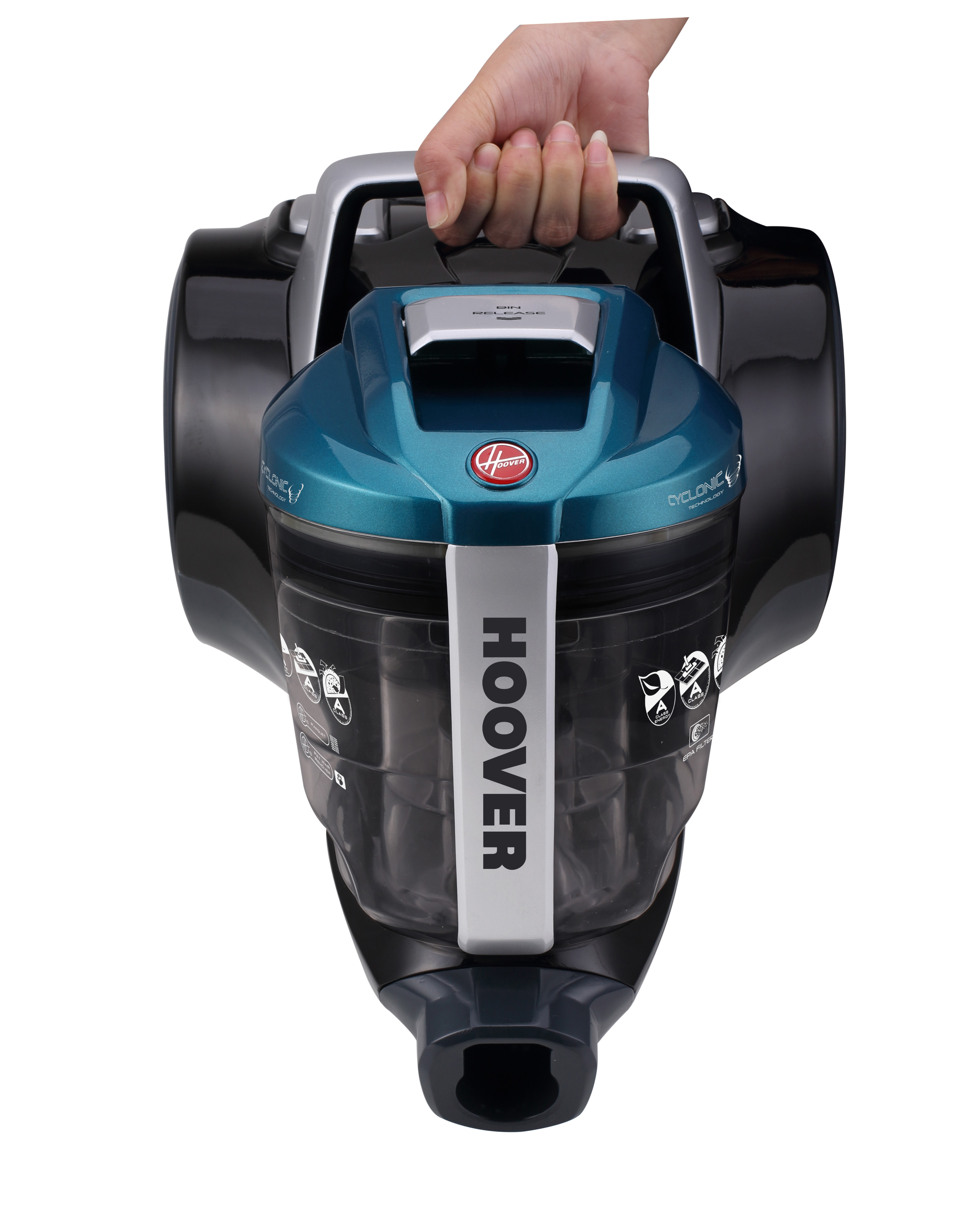 Hoover Staubsauger von oben. Eine Person hält ihn von oben fest.