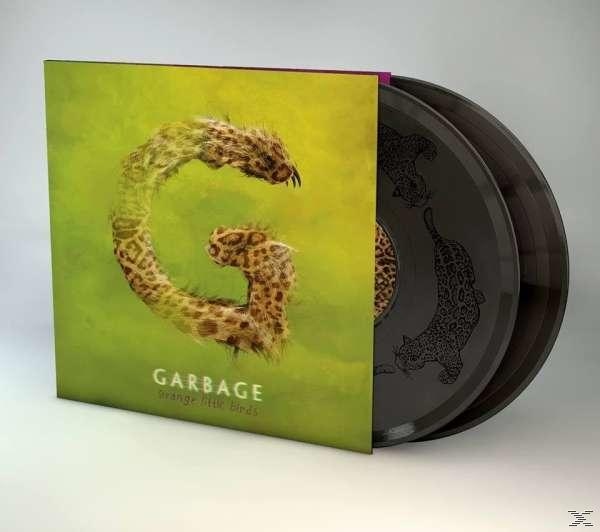 Platenhoes met een luipaard 'G' op groene achtergrond; twee zwarte vinylplaten.