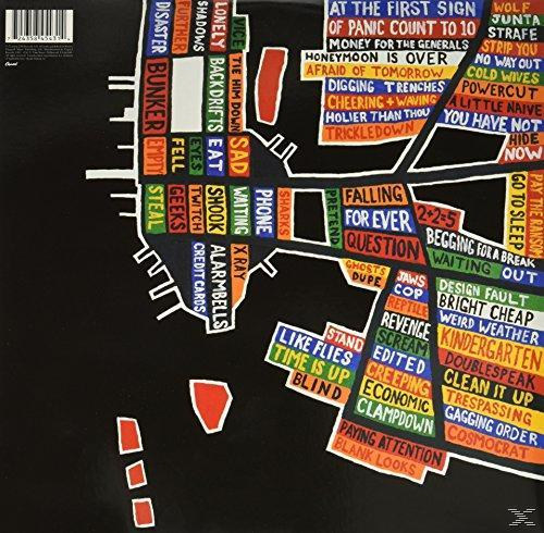 Album back cover with a colorful map-like design and song titles listed.