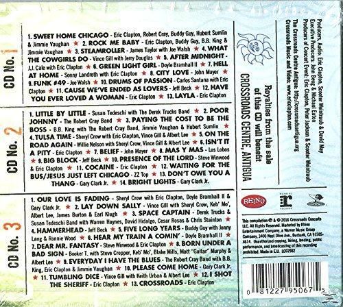 Album-Rückseite mit drei CD-Titellisten. Enthält Künstlernamen, Logos und einen landschaftlichen Hintergrund.