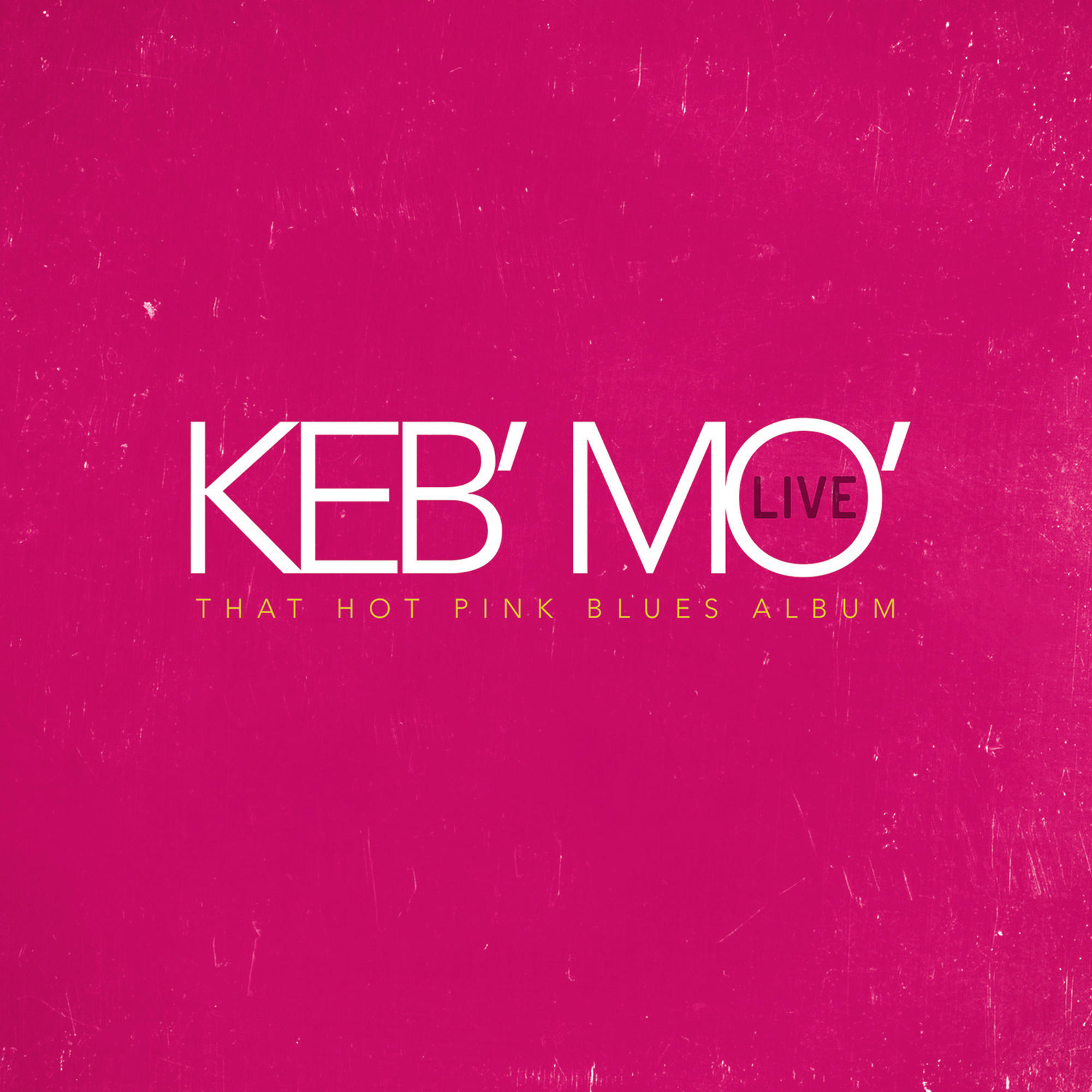 Album borító fehér 'KEB MO LIVE' felirattal, rózsaszín háttéren.