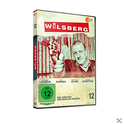 DVD-Cover für den Film 'Wilsberg', ein Mann hält eine Pistole, ein grüner Bewertungskreis, vor einem Hintergrund.