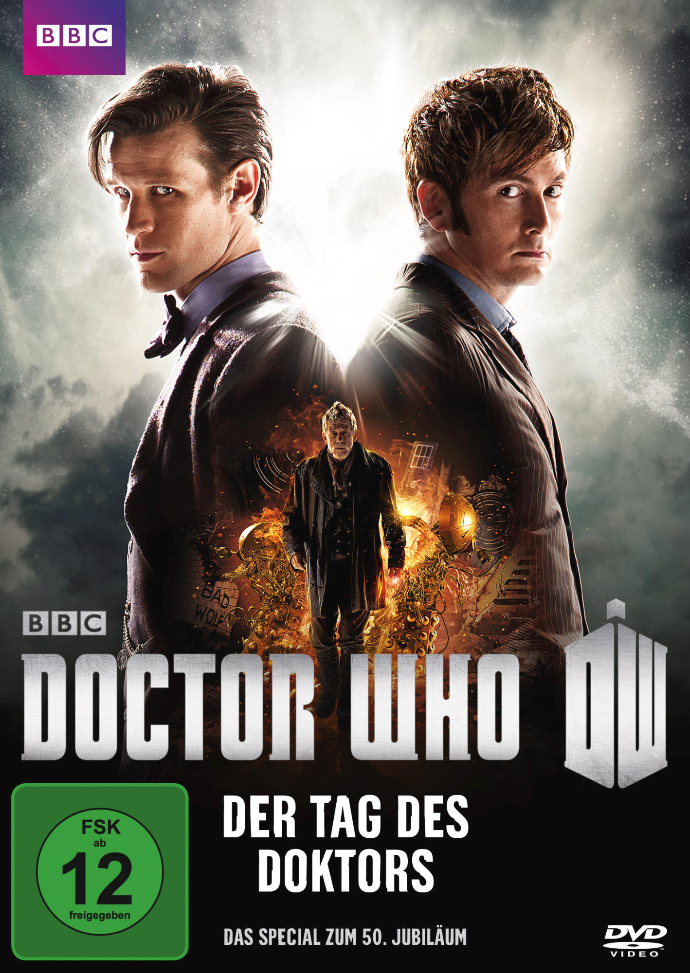 Doctor Who DVD-Cover. Matt Smith und David Tennant mit einem zentralen Bild eines Doktors. Text: Der Tag des Doktors.