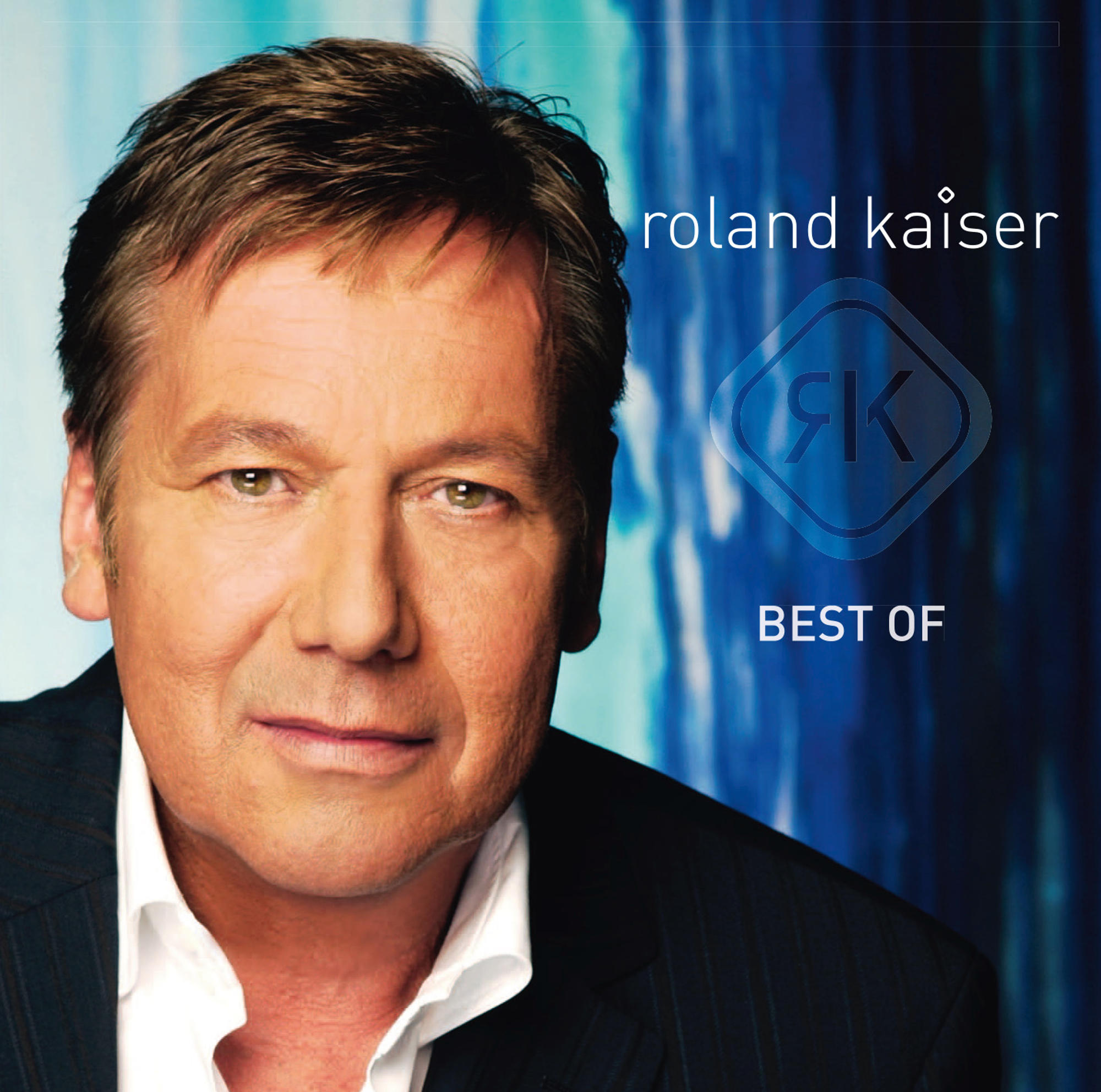 Roland Kaiser Albumcover. Ein Mann im Anzug vor blauem Farbverlauf.