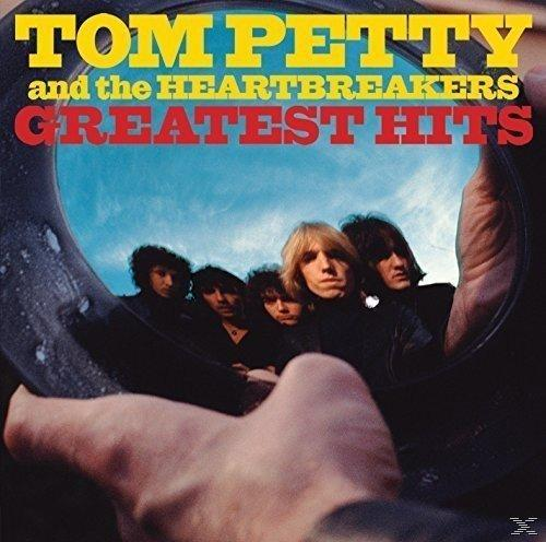 Albumcover von Tom Petty and the Heartbreakers' Greatest Hits, mit Bandmitgliedern im Kreis.