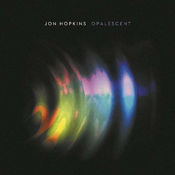 Album borító. Jon Hopkins Opalescent. Absztrakt színek. Kék, sárga, zöld és lila.
