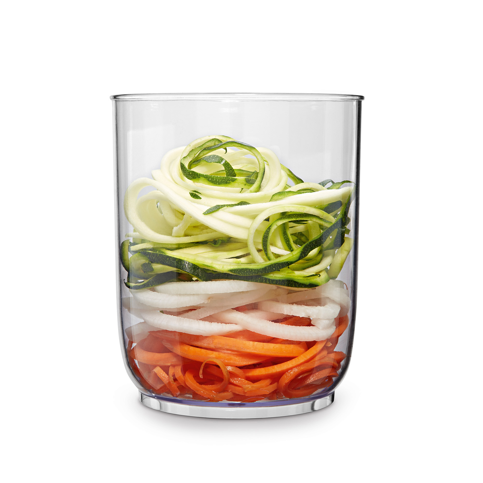 Vaso trasparente con strati di spirali di zucchine, carote e ravanelli bianchi.