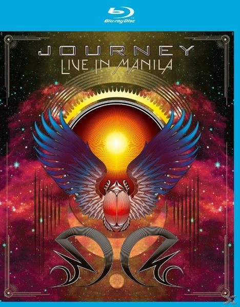 Blu-ray-Cover mit einem Logo von Flügeln mit einer Sonne in der Mitte. Der Titel lautet 'Journey Live in Manila'.