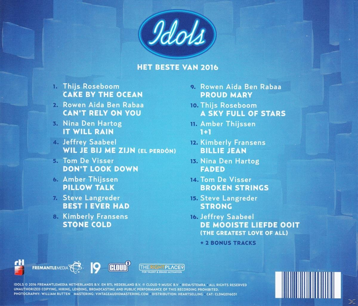 Albumhoes met 'Idols'-logo. Lijsten met songtitels en artiesten, waaronder Thijs Roseboom, Rowen Aida Ben Rabaa en Kimberly Fransens.